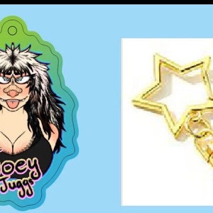 May include: A colorful, cartoon-style character with black hair and a black tank top. The character has a pink tongue sticking out and the text "Joey Juggs" is written below the character. The character is on a white background and is attached to a gold star-shaped keychain.