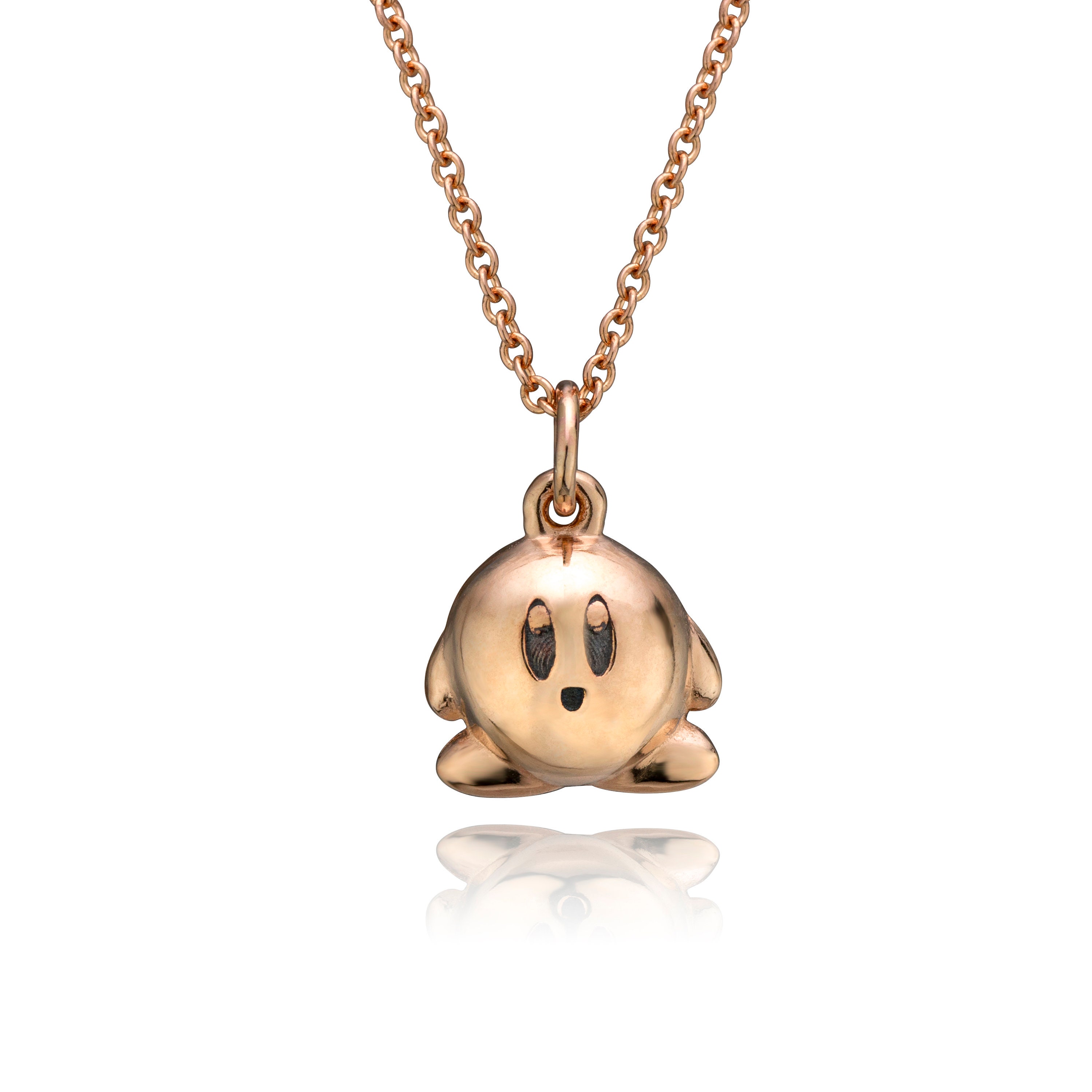 Small 10 Karat Rose Gold Kirby Pendant With Silver Chain Small 10 Karat Rose Gold Kirby Pendant With Silver Chain