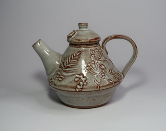 Decorated ceramic handmade teapot; Carved handmade ceramic teapot