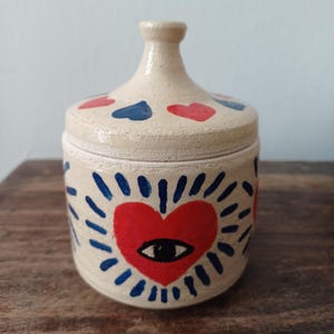 Ceramic decorated lidded jar; Ceramic box with a matching hearts decorated lid