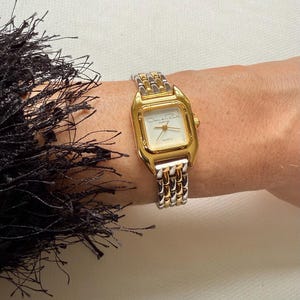 Oscar De La Renta Ladies Watch Silver & Gold Tone - Brand  display picture 2