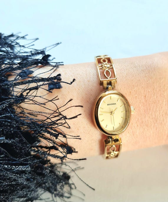 Damen Vintage Gold Quarzuhr von SEKONDA zierliche Vintage