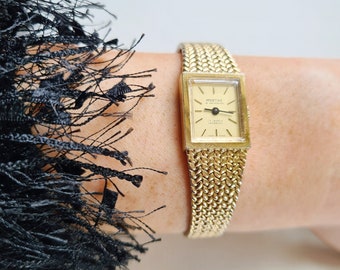 Vintage 1970s Mechanic Wind Up Gold Plated Woven Mesh Strap Ladies Wristwatch By Montine Of Switzerland.