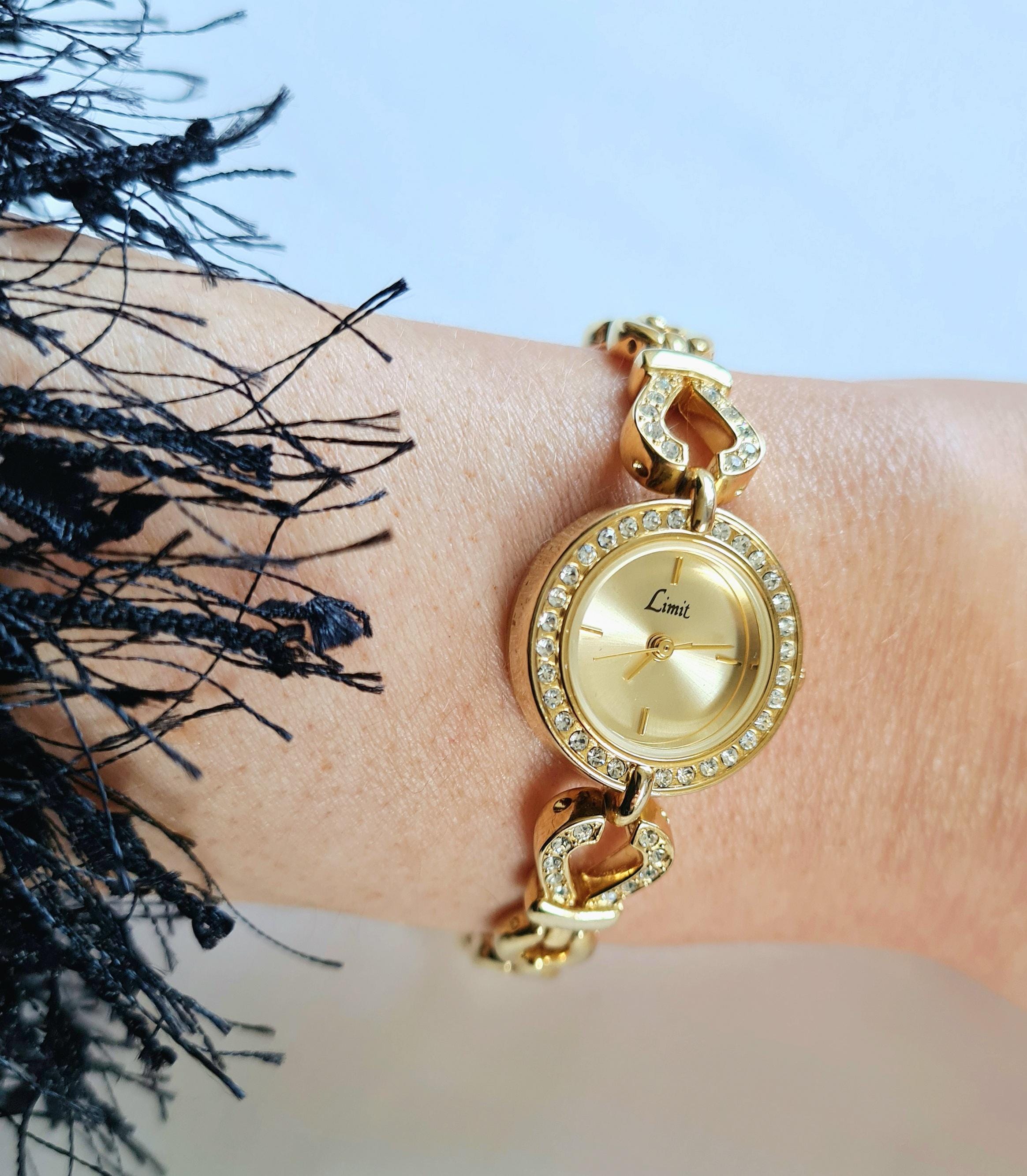 Ladies Vintage Crystal Encrusted Gold Watch by LIMIT  display picture 2