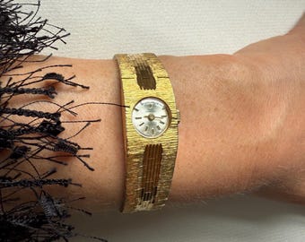 243 Swiss Empress Ladies gold plated  / gold plated bracelet watch / 1970s gold watch/ vintage gold quartz watch / 17 JEWELS Incabloc watch