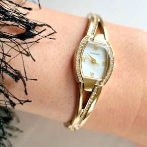 Vintage Women&#39;s Gold tone oval Quartz Battery watch By Sekonda / with rhinestone crystals and mother of pearl face / gold cocktail watch