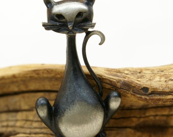 Vintage Black and Silver Pewter Cat Sitting On Her Log just waiting for you to feed her Brooch/Pin.