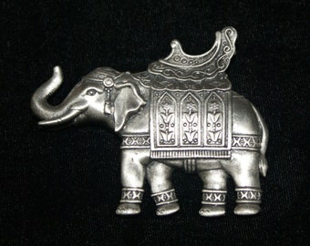 Vintage JJ Jonette Artifacts Elephant Pin Brooch with a ancient style Howdah on its back.