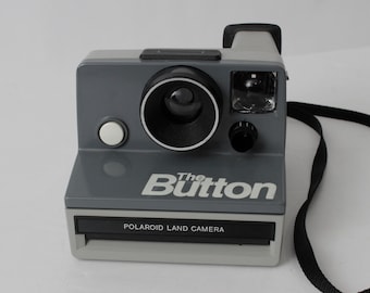 Cámara Polaroid Vintage El Botón Gris Negro Película Instant Develop - 80's Retro