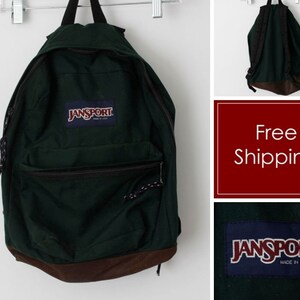 Jansport black clearance backpack leather bottom