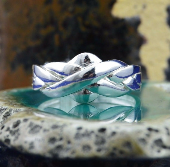 Bague puzzle 12 anneaux sale
