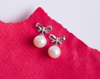 Orecchini a bottone con fiocco scintillante PANDORA originali in argento sterling Nuovo 290555CZ RITIRATO Viene fornito con sacchetto regalo PANDORA Spedizione veloce - Italia