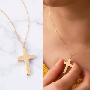 May include: Gold cross necklace with a personalized inscription that reads "Always in my heart 2021-0801".