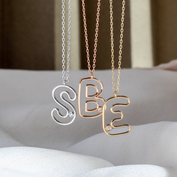 Couple shop alphabet pendant