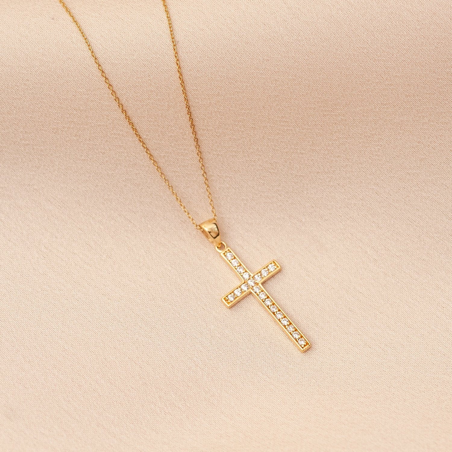 Elegant gold cross on sale necklace