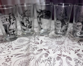 Vintage Earthbound Pint Glass Alice in Wonderland Illustrated by Sir John Tenniel we are all mad themed  retro pint glass choice