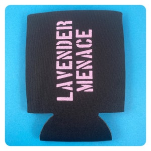 May include: Black neoprene can cooler with a pink "LAVENDER MENACE" graphic.