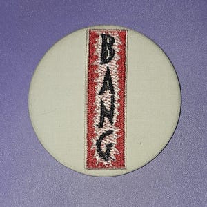 Bang - CC-Inspired Embroidered Pinback Button