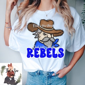 May include: White t-shirt with a blue and brown cartoon rebel graphic and the text "That's Sew Vinyl" and "REBELs".