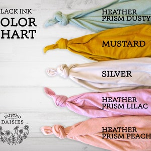 May include: A color chart displays fabric swatches in various hues. The text "BLACK INK COLOR CHART" is at the top. Colors include Heather Prism Dusty, Mustard, Silver, Heather Prism Lilac, and Heather Prism Peach. The "DUSTED-IN-DAISIES" logo is in the bottom left.