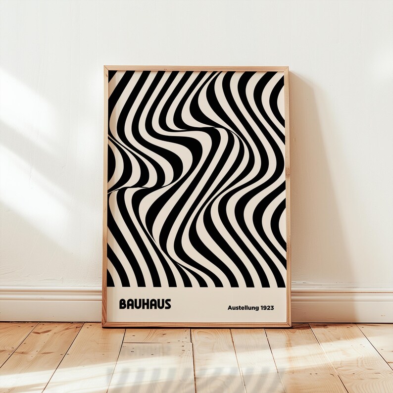 May include: Black and white abstract art print with wavy lines. The print has the text "Bauhaus Ausstellung 1923" at the bottom.