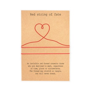 May include: Red string of fate card with a red heart and string design. The card reads: An invisible red thread connects those who are destined to meet, regardless of time, place or circumstance. The thread may stretch or tangle, but will never break.