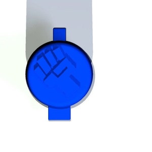 Peut inclure: Un bouton bleu avec un symbole de poing lev&eacute;.