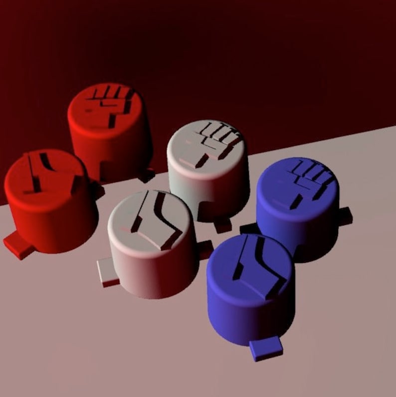 Peut inclure: Six boutons ronds avec diff&eacute;rents symboles. Deux boutons rouges ont un symbole de poing lev&eacute;. Deux boutons blancs ont un symbole de poing lev&eacute;. Deux boutons bleus ont un symbole de poing lev&eacute;.