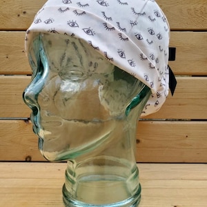 Eye Scrub caps for women, scrub hat, scrub cap, pixie cap, ponytail cap ~ nurse hat with eyes ~ CRNA hat ~ eyelash winking surgery hat