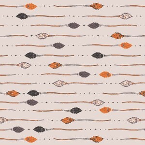 May include: A seamless pattern featuring a repeating design of orange, black, and gray broomsticks on a light beige background.