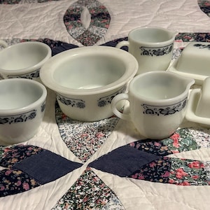 Pyrex vintage hostess pieces:  butter dishes, creamers, sugar bowls, butter tub, gravy boats all  in Old Town Blue Onion design