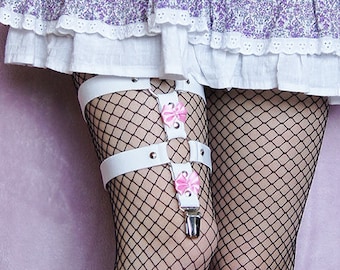 Witte zoete gothic-kousenband met roze strikken