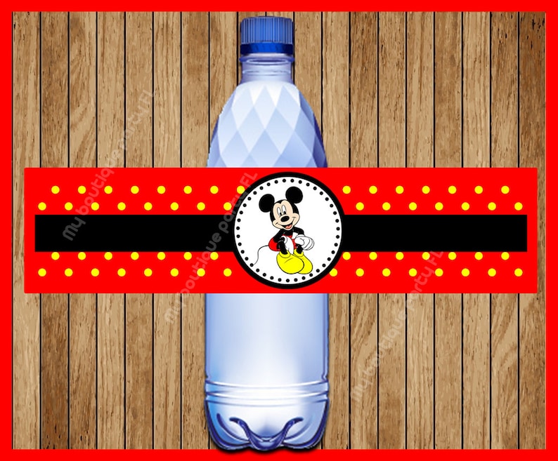 May include: Red and yellow polka dot water bottle label with a black stripe and a circle featuring Mickey Mouse in the center.