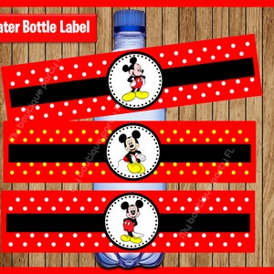 May include: Three red and white polka dot water bottle labels with a black stripe and a circle featuring Mickey Mouse in the center. The text "Water Bottle Label" is at the top of the image.