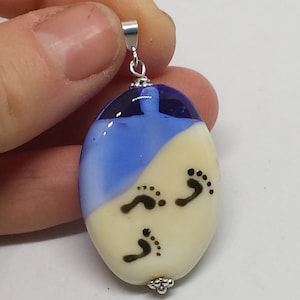Footprints in the sand Lampwork bead pendant with sterling bail (blue)