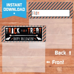 May include: Printable Halloween treat bag labels with orange and black stripes. The label says "Trick or Treat" with a ghost and bats. The label also says "Happy Halloween!" and has a space for a name.