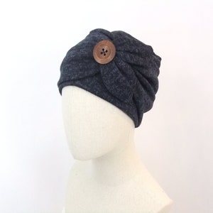 Warm winter chemo hat for woman with button detail, marled navy blue, lined in cotton