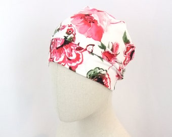 Chemo hat for a woman, pink  flowers on white background