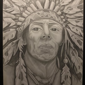 May include: A black and white graphite drawing of a person wearing a large feathered headdress. The individual has a serious expression, with detailed shading on the face and neck. A necklace with rectangular links rests on the chest area.