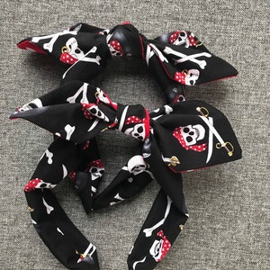 Headbands with character, Pirates and polka dots,  themed bow band
