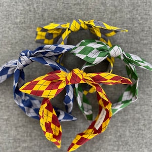 Headbands with character, magical school houses in argyle  themed bow band