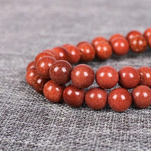 4mm-12mm Goldstone Smooth and Round  Beads,15 inches one starand