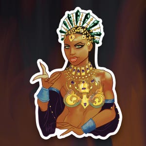 May include: A sticker featuring a stylized illustration of a person adorned in gold and green jewelry, a headdress, and a dark blue top. The person has green eyes and is gesturing with one hand. The sticker has a white border.