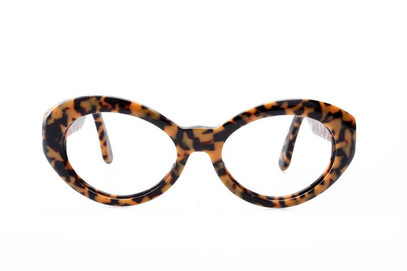 italian high fashion model from the 90s super gently used Versace sunglasses frames leopard cello enriched by golden sculptural appliques