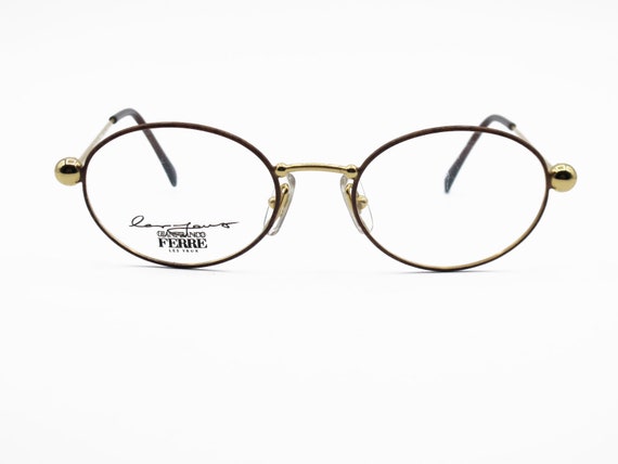 sunglasses and baseball cap