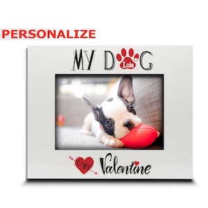 May include: White picture frame with a red paw print and the text "My Dog" with the name "Lola" underneath. The frame has a photo of a dog inside and the text "Is My Valentine" with a red heart and arrow.