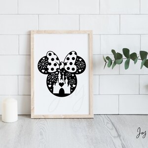 May include: Black and white silhouette of Mickey Mouse ears with a bow and a castle inside. The bow has white polka dots. The castle has a heart on the front. There are fireworks around the castle.