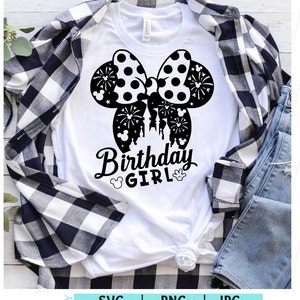 May include: White t-shirt with a black and white polka dot bow with fireworks and a silhouette of Cinderella's castle. The text "Birthday Girl" is below the bow.