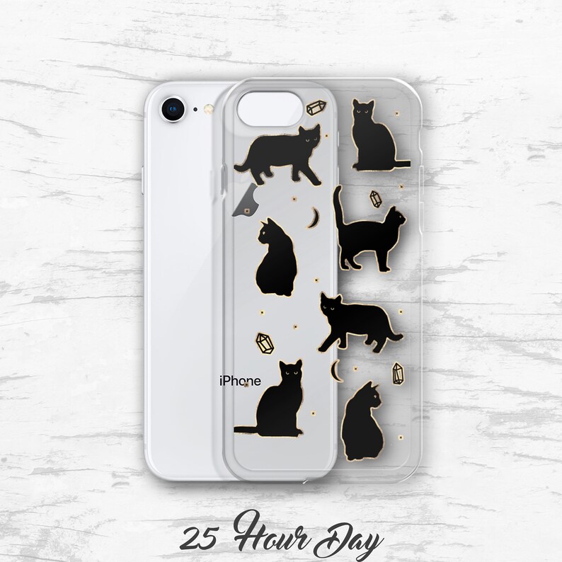 May include: A clear phone case with a black silhouette design of cats and crystals. The text "25 Hour Day" is printed on the bottom of the case.