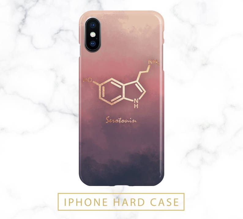 May include: iPhone hard case with a gradient design in shades of pink, red, and navy blue. The case features a gold-colored serotonin molecule graphic and the word "Serotonin" in a matching gold font.